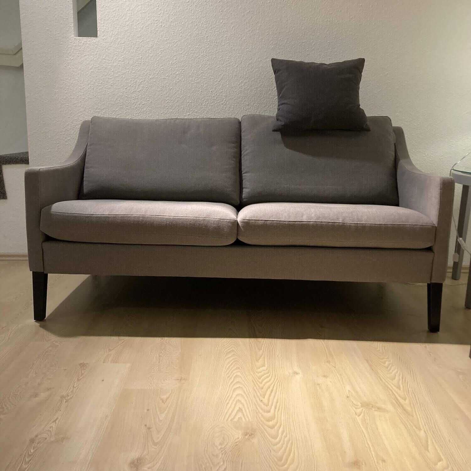 Sofa Nelson Stoff U3221F Braun Lila mit Kopfstützkissen